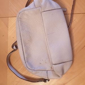 Cream colored crossbody kate spade bag